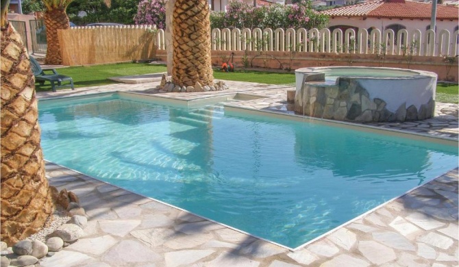 Stunning apartment in Valledoria with Outdoor swimming pool and 1 Bedrooms